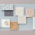 Luxury tile and stone samples in marble, quartzite, and porcelain arranged on a flat lay for a 30A remodel