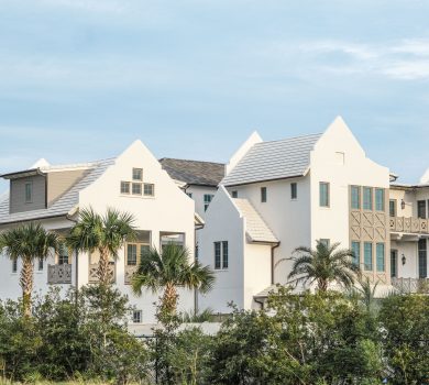 Alys Beach home design featuring white houses surrounded by tropical landscaping