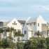 Alys Beach home design featuring white houses surrounded by tropical landscaping